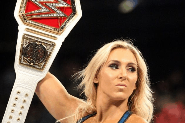 charlotte-holding-up-the-belt